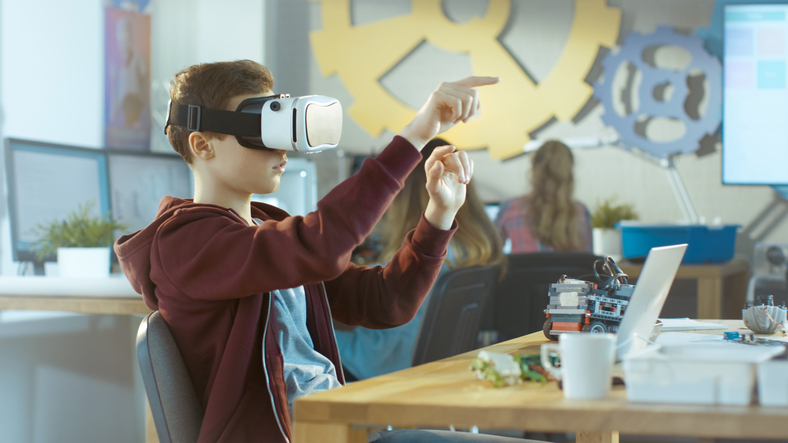 child using virtual reality goggles